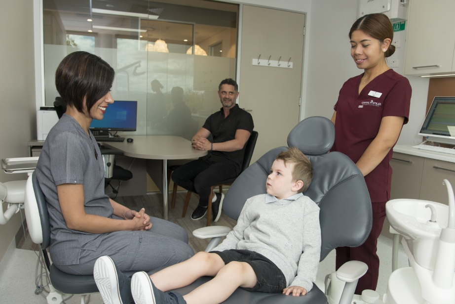 Orthodontist Specialist Clinic Canberra Capital Smiles - Dr Singh giving treatment