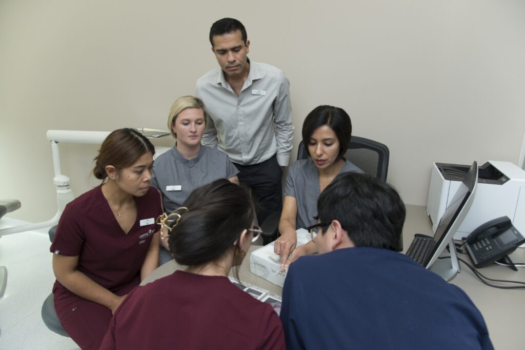 Orthodontist Specialist Clinic Canberra Capital Smiles - Team discussing treatment